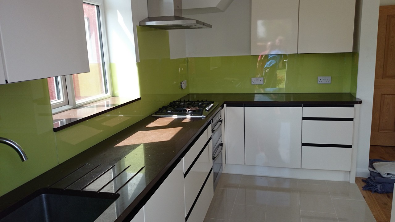 Lime green glass kitchen splashback installed by Waterloo glaziers
